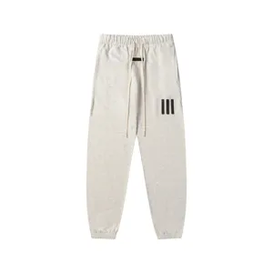 High street casual sweatpants for men and women, classic grey jogger with long drawstrings.
