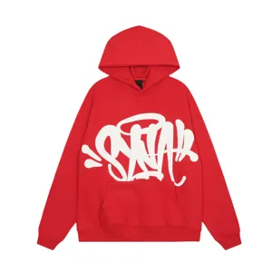 Red fleece hoodie detail featuring white graffiti letter print, front pocket and ribbed hem.