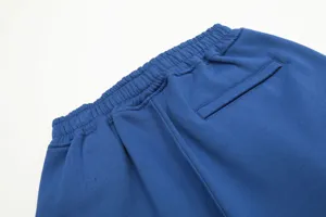Blue casual shorts detail showing elastic waistband and back pocket design for daily wear.