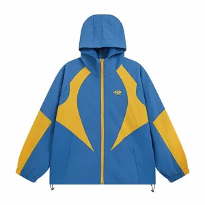 Blue and yellow colorblock hooded windbreaker jacket detail showcasing fine embroidery design.
