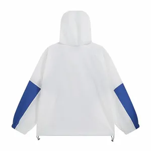 Back view of white hooded windbreaker jacket with blue color block sleeves casual outerwear.