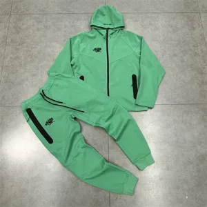 Comfortable green fleece-lined hoodie and sweatpants set featuring stylish embroidery details.
