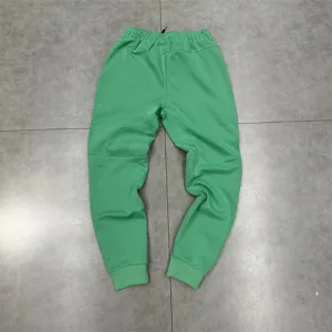 Comfortable green casual sweatpants for men and women, perfect for daily wear and sports.