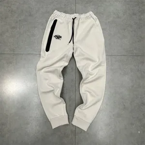 Comfortable fleece-lined streetwear jogger sweatpants with zip pocket and drawstring waist.