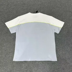 Detailed back view of a colorblock short sleeve t-shirt featuring contrast stitching design.