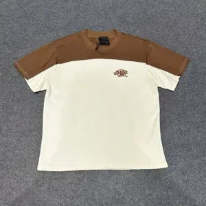 Brown and white colorblock short sleeve t-shirt with stylish chest embroidery detail.