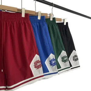 Lassige Sportshorts für Damen und Herren, elastischer Bund, farbblockierte Mesh-Hose.