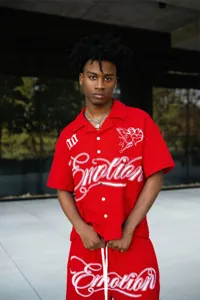 Red waffle knit short sleeve shirt and shorts set with Cupid embroidery for men and women.