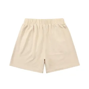 Comfortable beige waffle knit casual shorts with elastic waistband for daily wear and relaxed summer style.