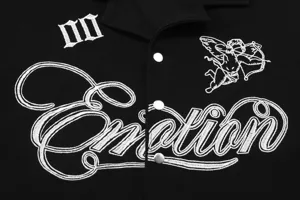 Black waffle knit short sleeve shirt featuring white cupid embroidery and emotion typography detail.
