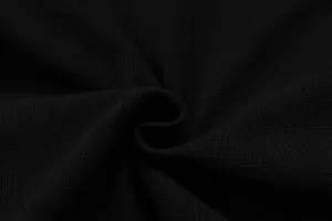 Black waffle knit fabric detail closeup, showing soft texture and premium quality material.