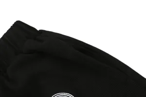 Black waffle shorts waistband pocket detail with white embroidery for men and women streetwear.