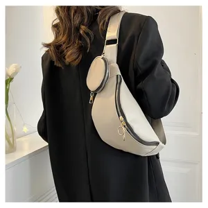 Sac à bandoulière poitrine en cuir PU de couleur unie avec une jolie petite poche