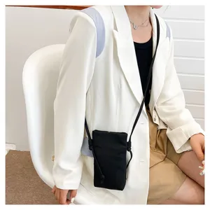 Sac bandoulière minimaliste en toile noire pour femme, petit sac de téléphone portable.