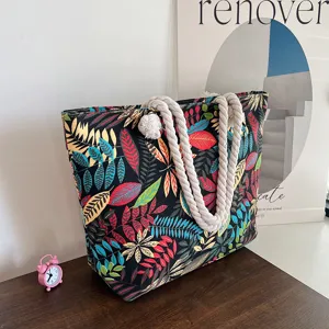Bunte Blätter Druck Canvas Schultertasche Detail, lässige Tasche mit dicken Seilgriffen.