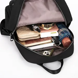 Sac à dos matelassé en tissu oxford noir, sac casual grande capacité pour voyage étudiant.