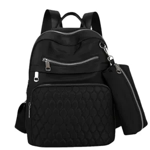Sac à dos matelassé en tissu oxford noir avec poche avant pour les femmes au quotidien.