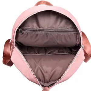 Stijlvolle roze dames rugzak van oxford stof, casual dagrugzak met handige binnenvakken.