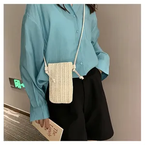 Mini sac bandoulière en paille pour femme, petit sac d'été tissé style décontracté.