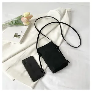 Petit sac bandoulière noir pour femme, sac de téléphone minimaliste décontracté avec fine lanière.
