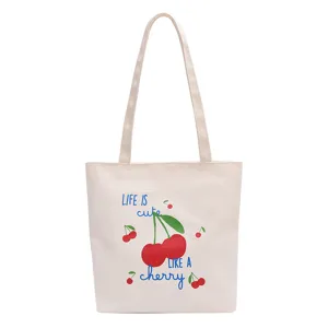 Casual beige canvas shopper met schattige kersenprint en grote capaciteit voor dagelijks gebruik.