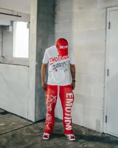 Streetwear t-shirt and pants set featuring stylish cupid print and graphic text.