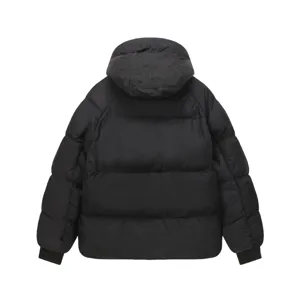 Back detail view of black streetwear hooded puffer jacket featuring debossed graffiti text.