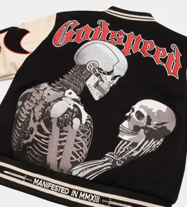 Black and white varsity jacket featuring detailed skeleton embroidery and streetwear Godspeed text.