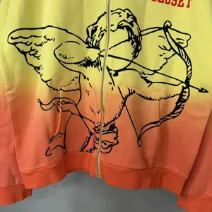 Gradient zip-up hoodie featuring striking cupid graphic print and vibrant yellow to orange.