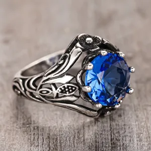 Vintage blue gemstone gothic ring with ornate carved silver tone vintage jewelry design