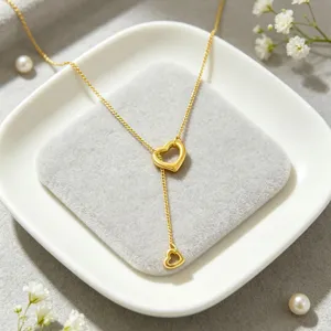 Detailed view of 18k gold plated stainless steel double heart Y necklace for women chic jewelry