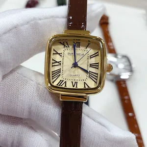 Square vintage women watch with brown leather strap and roman numerals elegant timepiece.