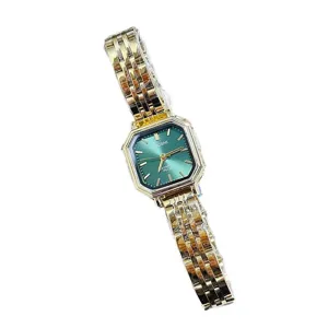 Women vintage quartz watch featuring a gold octagonal case and elegant dark green dial.