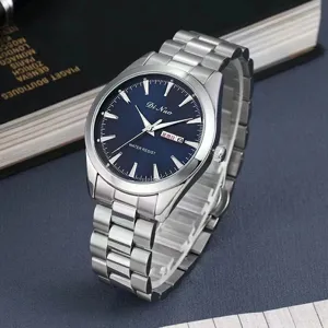 Detailed view of the DiNuo quartz watch featuring a blue dial and steel strap.