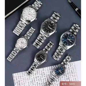 Stylish stainless steel quartz couple watch set with date display and classic dial design.