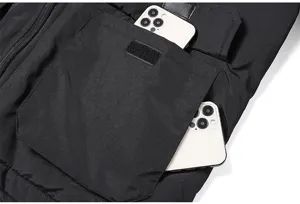 Men's winter jacket pocket detail showing large capacity storage for daily smartphones.