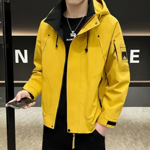 Men's yellow hooded workwear jacket, stylish outdoor windbreaker for spring casual wear.