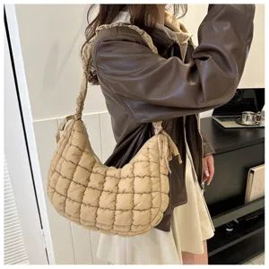 Beige quilted hobo underarm shoulder bag with gathered strap, trendy casual daily style for women.