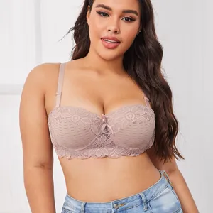 Reggiseno a mezzo calice push-up in pizzo taglie forti, dettagli floreali e sostegno.