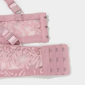 Pink lace plus-size bra back strap and hook detail shot, breathable and elegant lingerie.