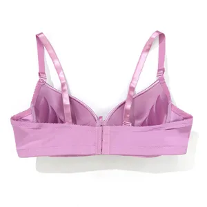 Detailed view of the comfortable solid pink push-up bra, showing back design and smooth cups.