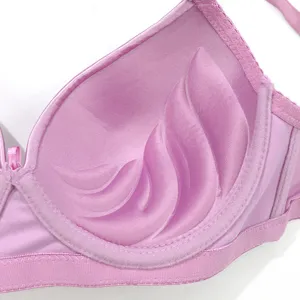 Detail view of a light purple padded push-up bra cup with unique 3D molded texture design for comfort.