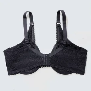 Black lace plus size bra detail view showcasing delicate floral texture and strap construction