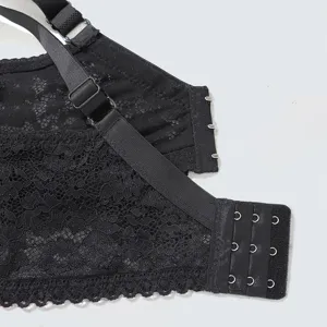 Black lace bra detail showing adjustable strap and back hook closure for comfort.
