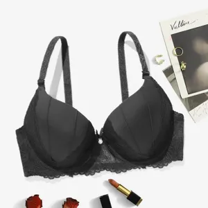 Vrouwen sexy zwarte beugel push-up bh met delicate kanten rand, comfortabele vulling en strik.