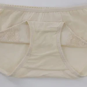 Women's mid-waist briefs with delicate lace trim, comfortable breathable daily underwear.
