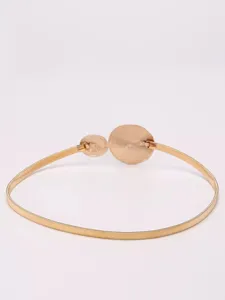 Gold metal waist belt for women, delicate double circle buckle elastic dress belt detail.