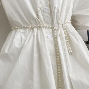 Elegant pearl waist chain with butterfly rhinestone buckle, perfect sweet accessory for dresses.