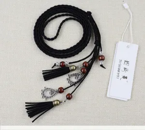 Handcrafted bohemian black braided waist rope with tassels and wooden beads for elegant dresses.