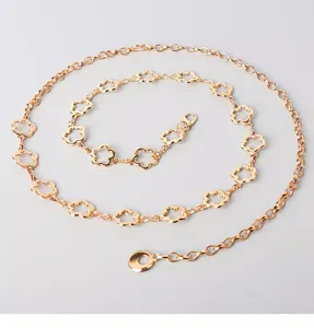 Elegant gold metal flower chain belt for women, stylish dress waist accessory and chic waistline decor.